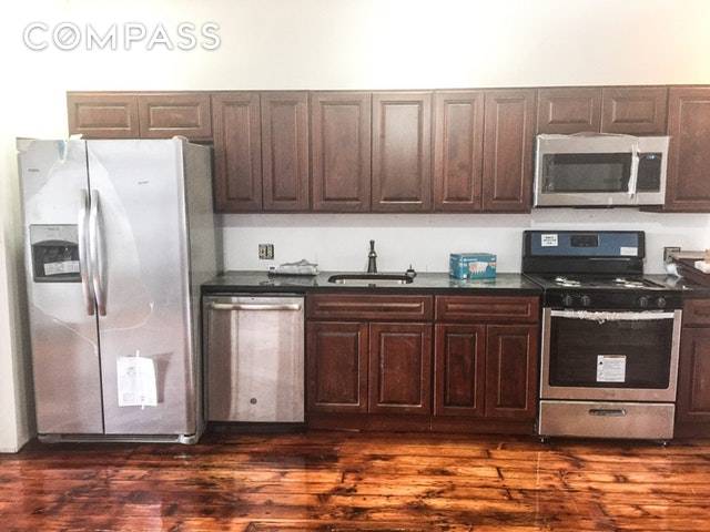 2 bedroom large apartment Newly renovated Great sunlight High ceilings Original wood floors 2 wood burning fireplace Mahogany Armoire Hot Tub Jacuzzi Washer dryer His and her sink