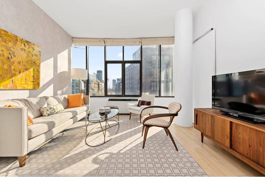 Fantastic Loft Like 1 Bedroom Apartment with 10 foot Ceilings and great Eastern City Views in one of Soho Nolita's hottest Condominiums.
