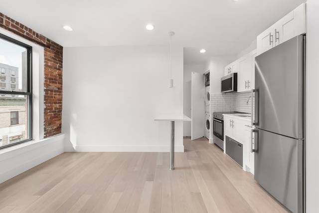 Welcome to 1057 Fulton, a building with an exterior that maintains the classic architecture of Clinton Hill while the interior was redone with no detail left unnoticed.