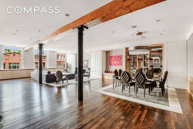 Enjoy true loft living in this flawless three bedroom, two and a half bathroom home, with direct elevator entry, in a boutique SoHo co op.