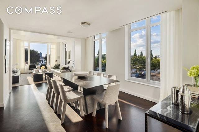 Make your home among spectacular sunsets and Hudson River views in this phenomenal three bedroom, three and a half bathroom showplace in the West Village's revered Super Ink building.