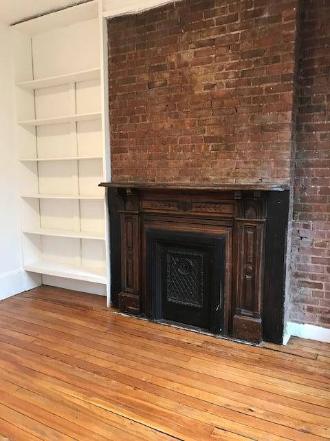 Exposed Brick, Decorative Fire Place, Great Location.