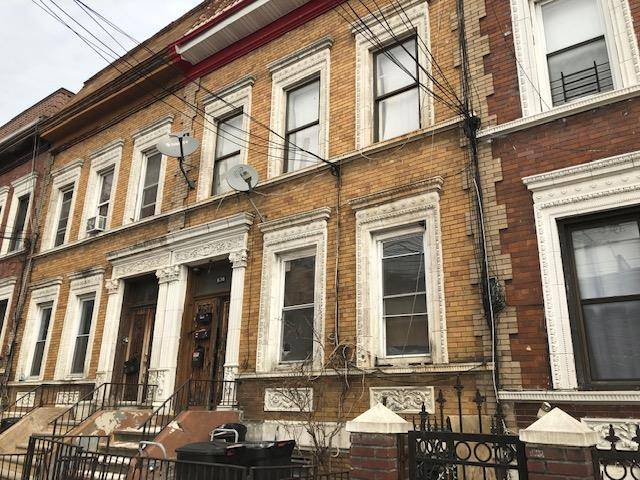 Gorgeous legal two family brick house with unlimited potential in red hot Hunts Point !