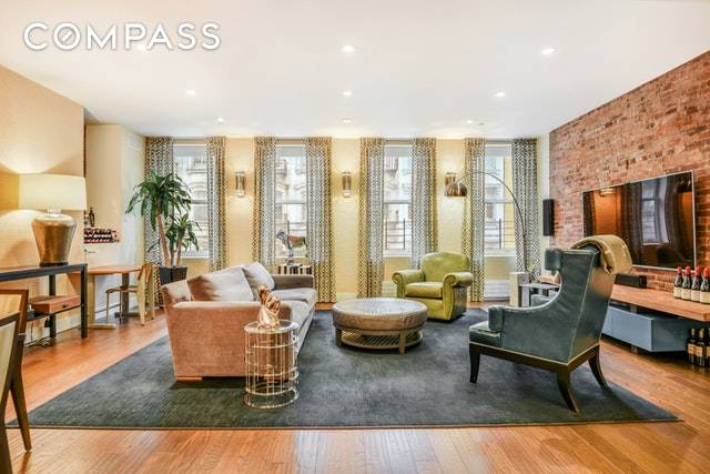 Prepare to be impressed when you enter this gorgeous, grand Tribeca loft.