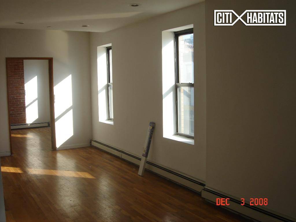 True 2 bedroom Very Sunny Walk in closet Open Kitchen Spacious Living Room Hardwood Floors Located in South Slop, by Subways !