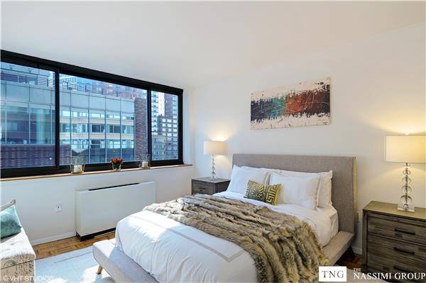 Sun drenched Massive One Bedroom Condo includes a living room large enough for a dining area, a high end kitchen renovation with granite counter tops, Sub Zero refrigerator, Bosch dishwasher, ...
