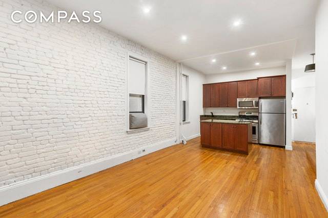 A beautifully renovated, spacious, and light filled corner three bedroom with a W D in prime Cobble Hill.