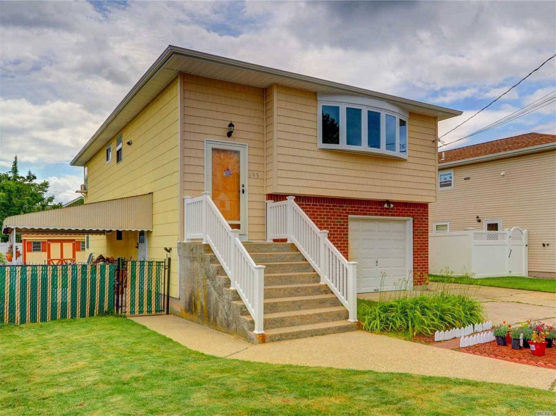 9 Room In Line Hi Ranch. Features Include Updated Full Bath, All New Interior Doors, New Pvc Railing, Fairly New Roof, New Front Vinyl Shake Siding, All New Gutters And ...