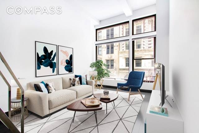 Beautiful modern loft in the Flatiron District with separate sleeping mezzanine is available for sale.