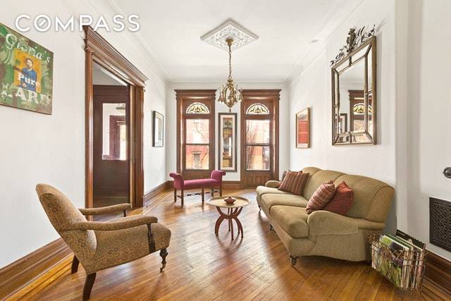 All Sweetness and Light best describes this 2 family Romanesque Renaissance Revival brownstone in prime Stuyvesant Heights.
