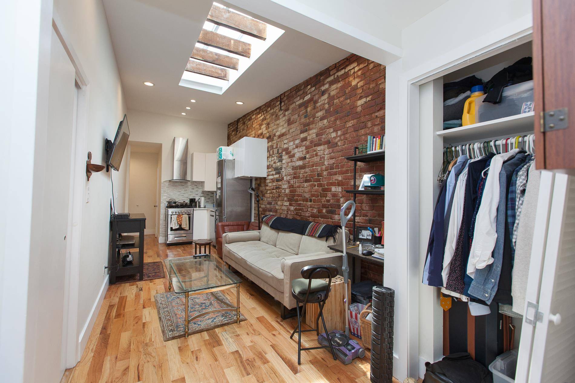 Beautifully renovated pre war 2BR in Greenpoint with high end appliances, great built in cabinetry, a skylight, and lovely exposed brick walls.