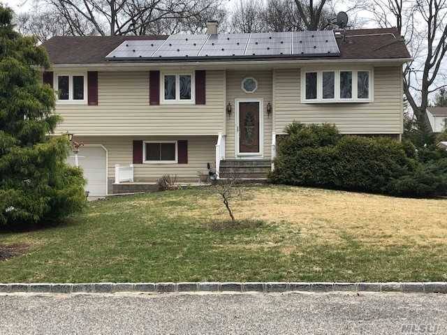 4 BR, 2 Bth High Ranch, Hardwood Floors tile with Radiant Heat in LR, DR, Kitch and Hall t, 10 year young roof, Solar Panels, 220 AMP, In Ground Sprinklers, ...