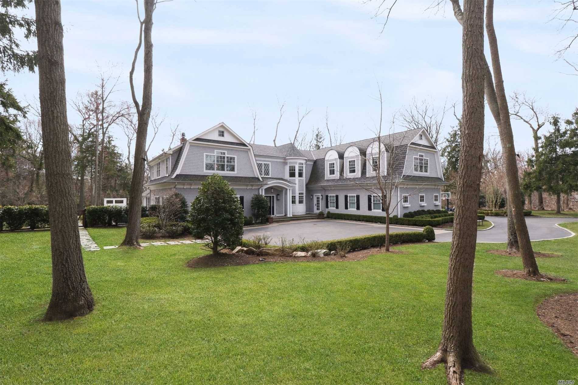 Exquisite details persist in this builders own custom colonial on 2 majestic acres in Muttontown.