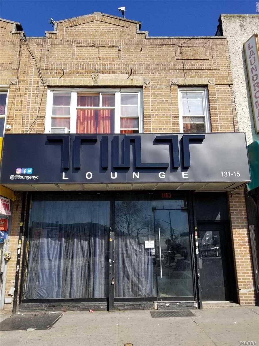 Mixed USE w Store Front On Ground Floor And 2 one bedroom Apartments on 2nd floor.