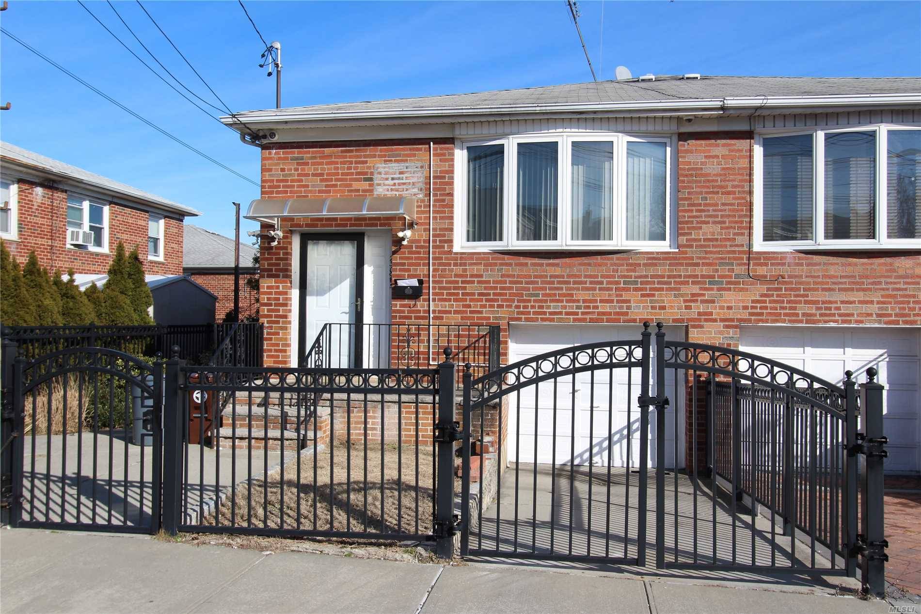 Semi Detached Brick Two Family Home.