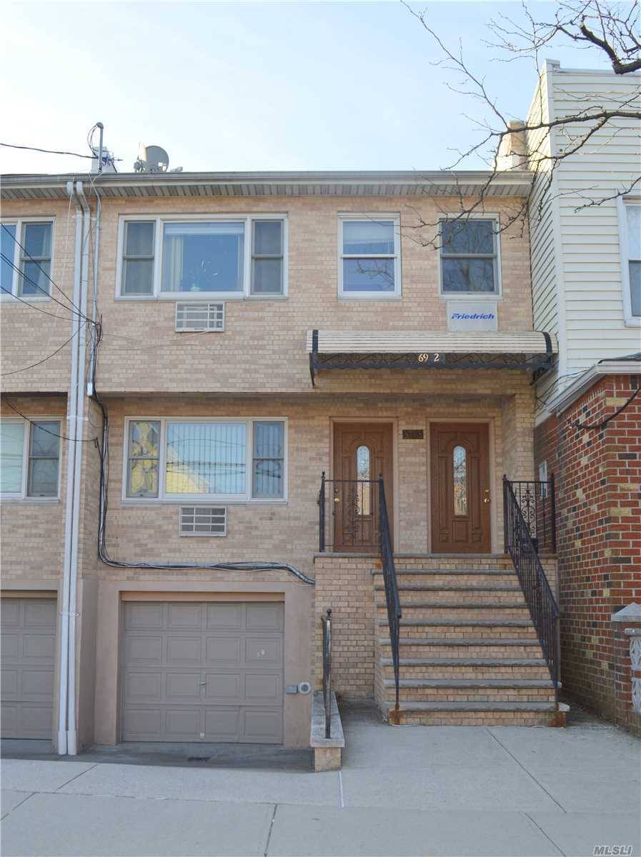 Excellent Brick 2 Family with Garage and Private driveway built in 2006 !