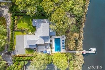 This custom built five bedroom five and a half bathroom waterfront respite sited on.