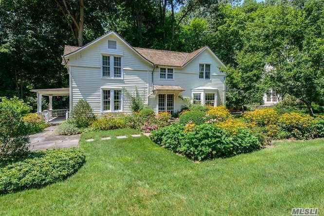 Orchard House, the quintessential country compound offering a circa 1840 farmhouse plus a 2 story gambrel roof barn.