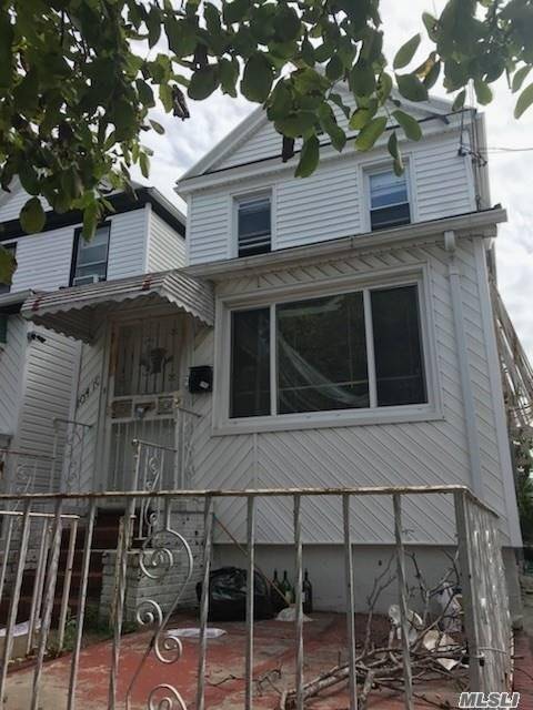 This Beautiful Two Family Is Located In The Heart Of Ozone Park First Floor Living, One Bedroom, Full Bath Second Floor Two bedrooms, Kitchen And Full Bath, Hardwood Floor Throughout, ...