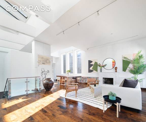 The Penthouse at 554 Broome Street is an architecturally significant, full floor duplex loft penthouse, with an unparalleled combination of chic indoor and outdoor living flooded with sunlight through three ...