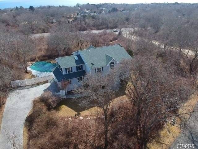 HUGE PRICE IMPROVEMENT. Nestled In Nature and tucked away in the Private Montauk Hills.