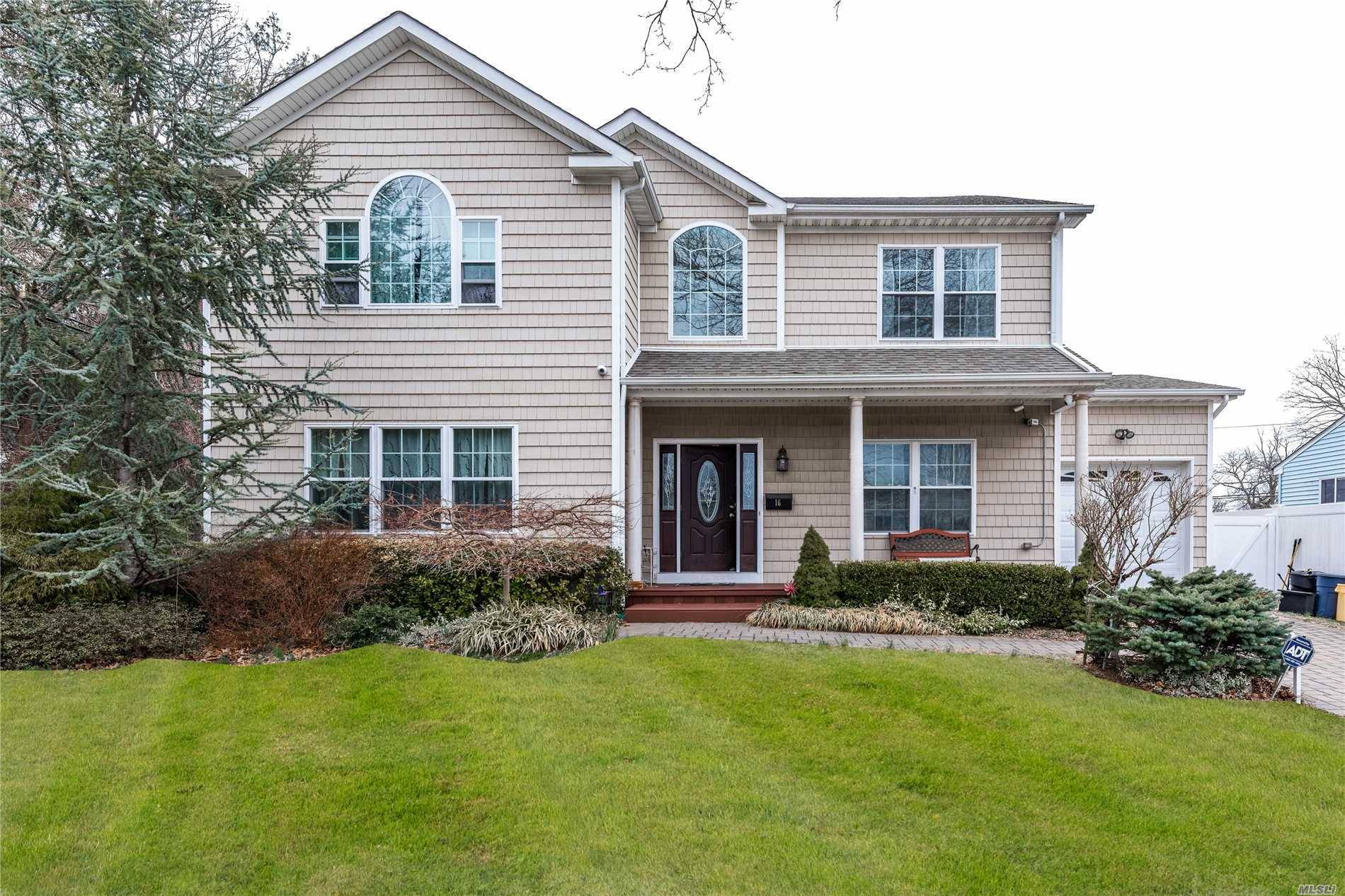 2010 Center Hall Colonial is set in a desirable community on the oversized fenced in yard.