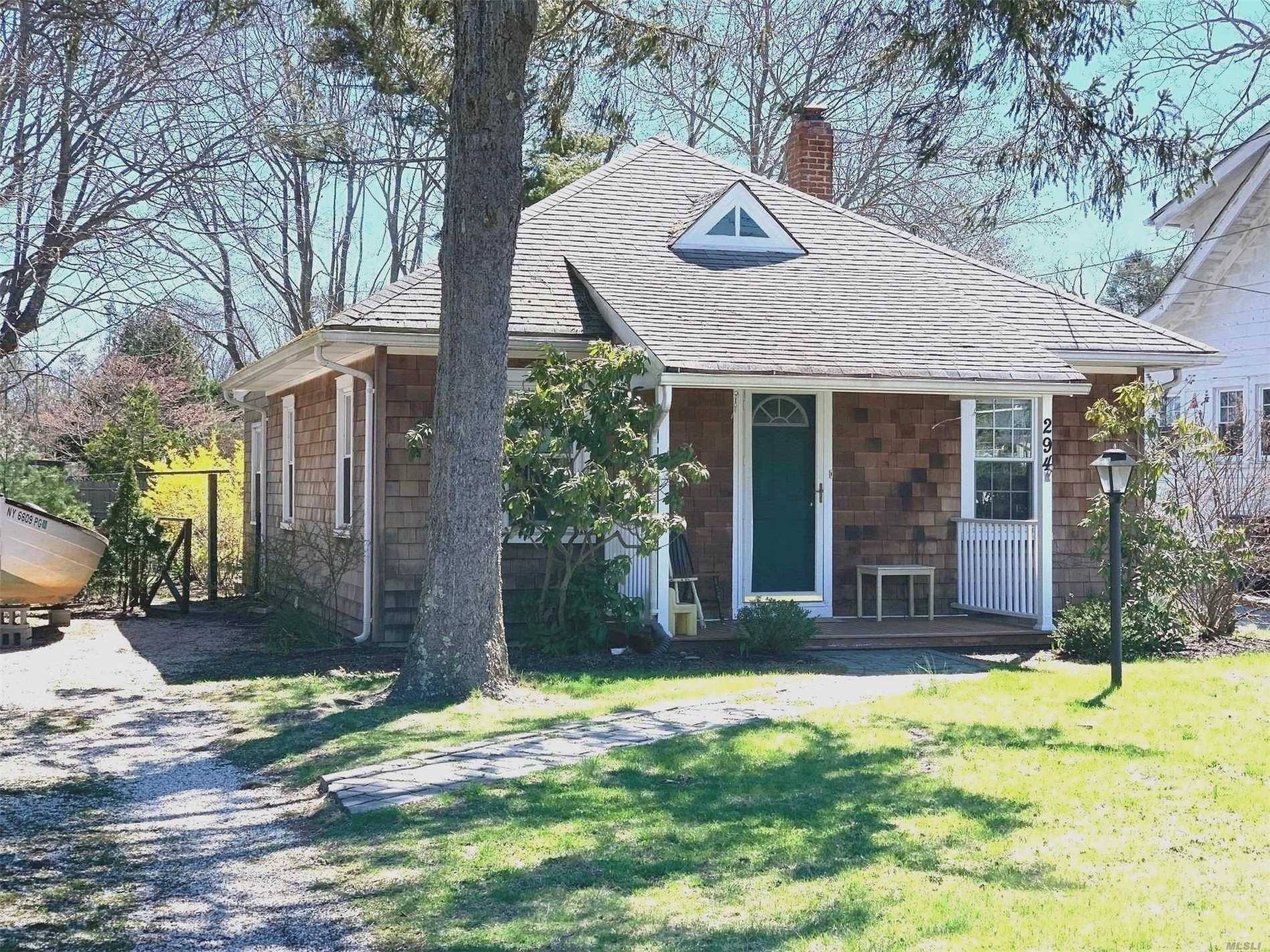 Charming three bedroom cottage in Westhampton Beach, south of the highway.
