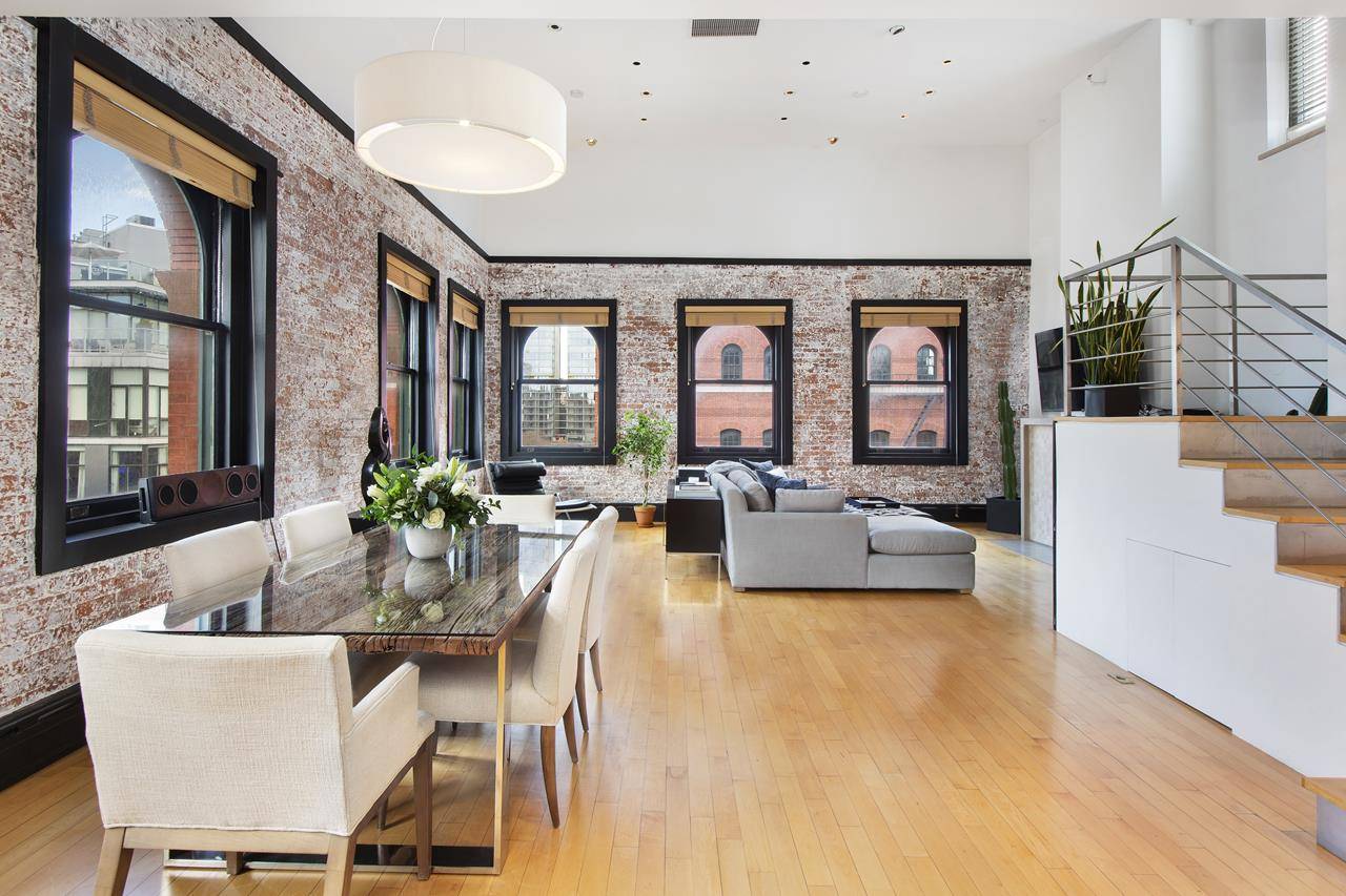 Experience the ultimate Tribeca loft living in this ONE OF A KIND PENTHOUSE with a private wrap around rooftop terrace offering Downtown Manhattan and Hudson River views.