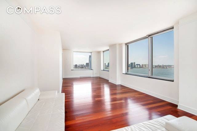 Beautiful views of the Hudson River and Freedom Tower abound from this elegant, over sized apartment in Battery Park s most luxurious, full service address at the Residences at the ...