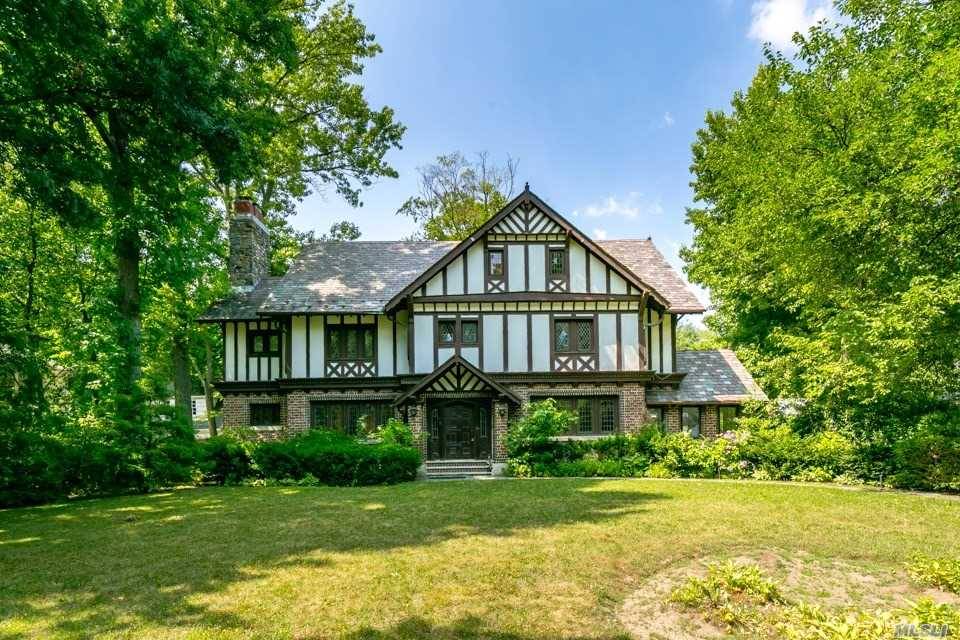 Majestic Large Sunny Tudor With Open Floor Plan.
