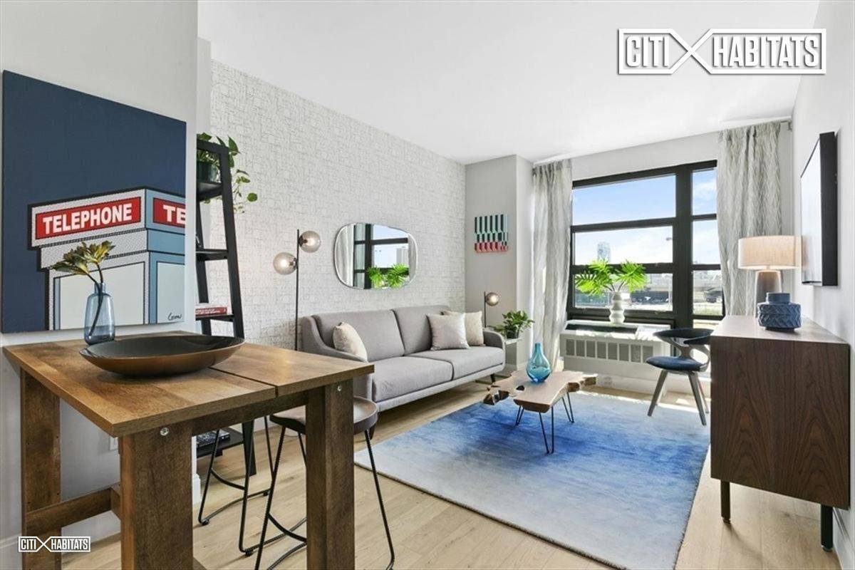 NO BROKER FEETHIS UNIT HAS A LARGE PRIVATE DECK THAT OVERLOOKS THE MANHATTAN SKYLINE !