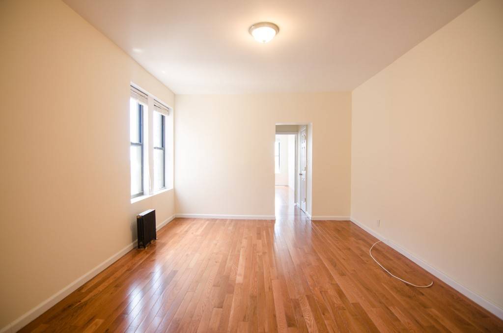 No Broker Fee ! ! ! This large 1 bedroom in Sunnyside features a separate renovated eat in kitchen with stainless steel appliances and granite counters.