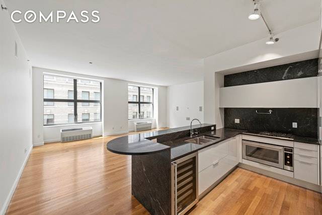 Welcome to apartment 8C at 240 Park Avenue South, a bright and beautifully appointed two bedroom, two and a half bathroom apartment.