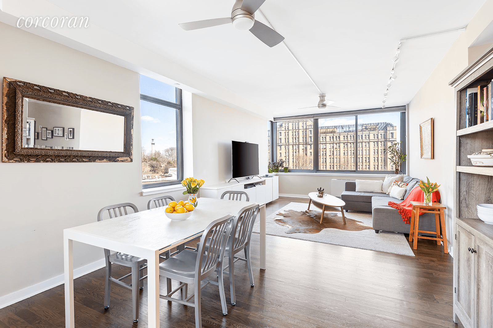 Come right in and be floored by sweeping views from every room of this stylish three bedroom, two bathroom full service Fort Greene condo unit.
