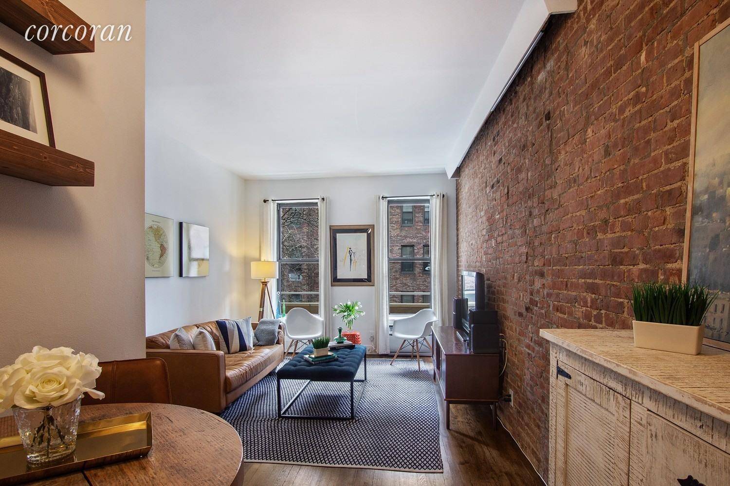 Renovated 1 bed, 1. 5 bath duplex offers warmth and charm with 9.