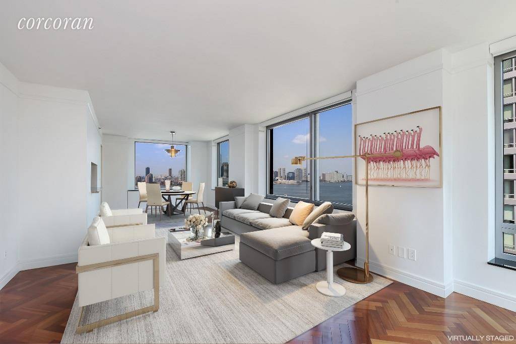 This breathtaking corner 2 bedroom, 2 bathroom apartment is located in The Ritz Carlton Residences, Battery Park Citys most distinctive full service, luxury condominium.