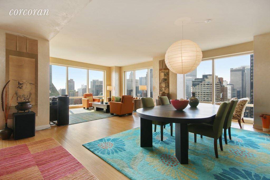 Spectacular views from every room define this light flooded 2 bedroom, 3 bath apartment with 10ft high ceilings at the internationally renowned Trump World Tower condominium.