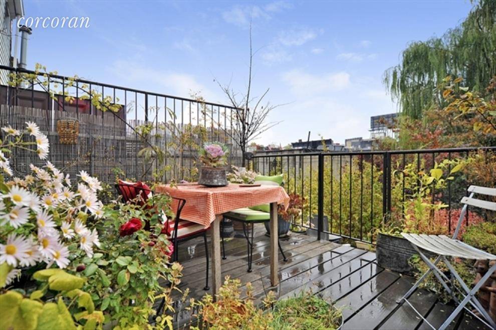 Centrally located Gowanus large two bedroom upper duplex with a private deck and shared garden.