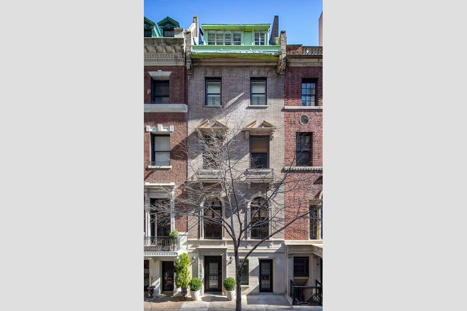 This beautiful Roman brick and limestone 20' townhouse was originally built in 1872 by Christopher Keyes according to the designs of John Sexton and part of 11 row houses which ...