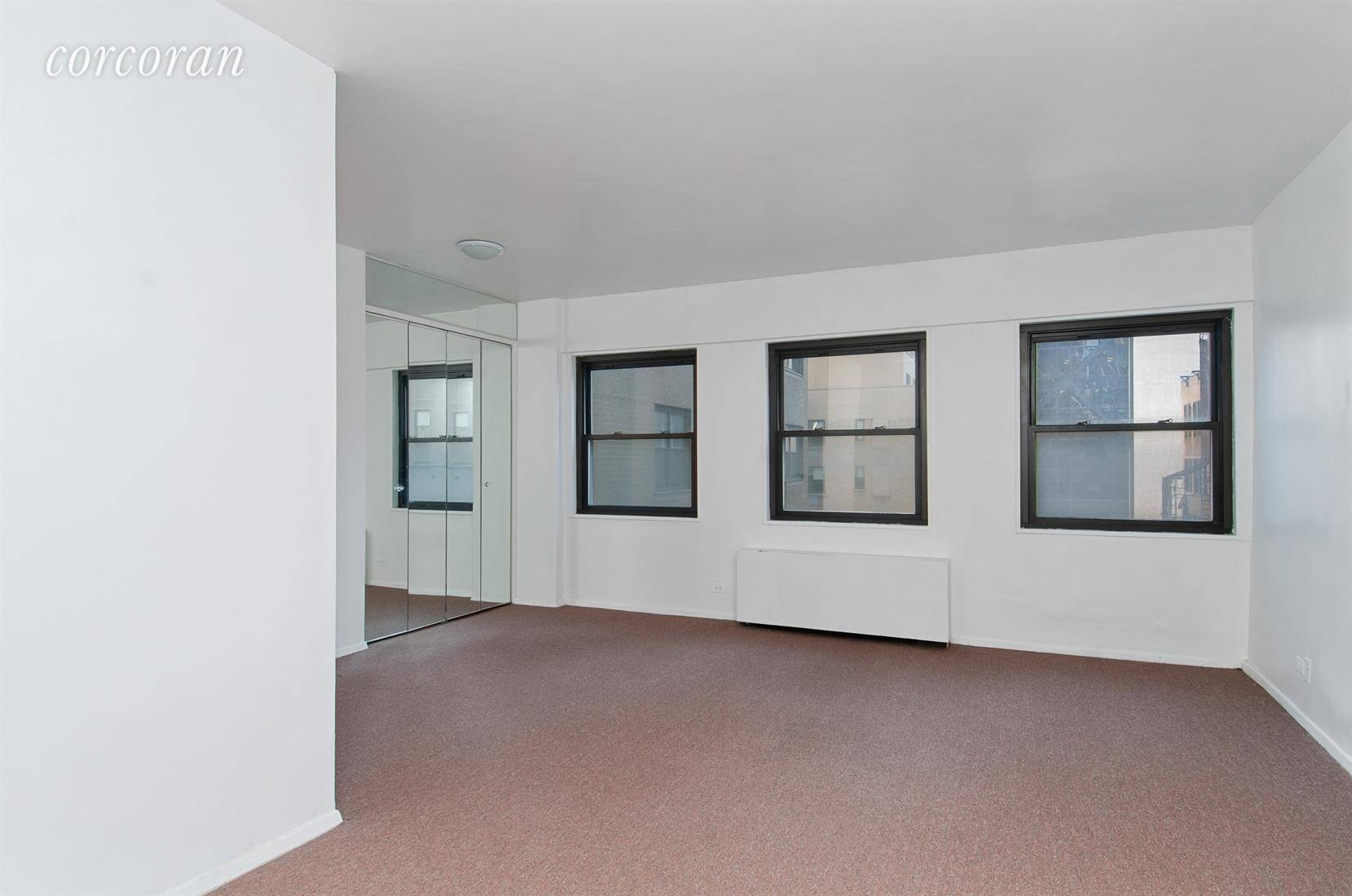 Huge Alcove Studio in Tower 58 Condo located in New York most prestigious block that is home to The Plaza Hotel.