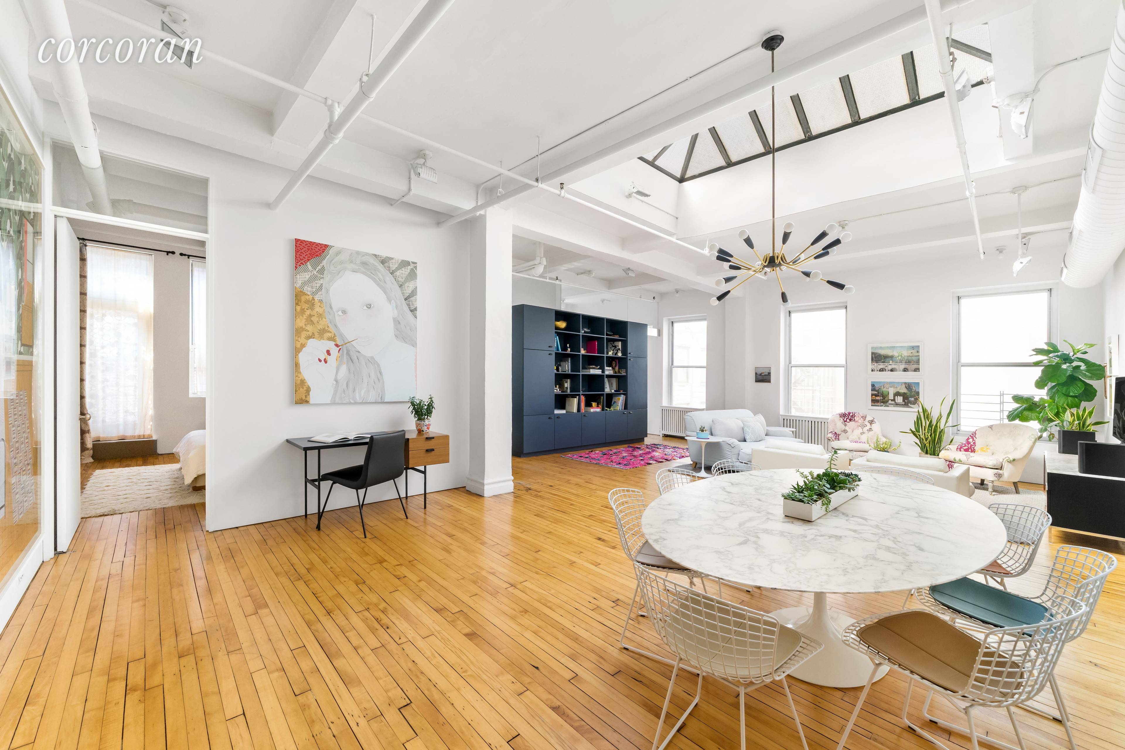 At the epicenter of Chelsea, Madison Square Park and NoMad, this perfectly situated top floor, sun drenched 3 bedroom, 2 bathroom co op defines loft living.