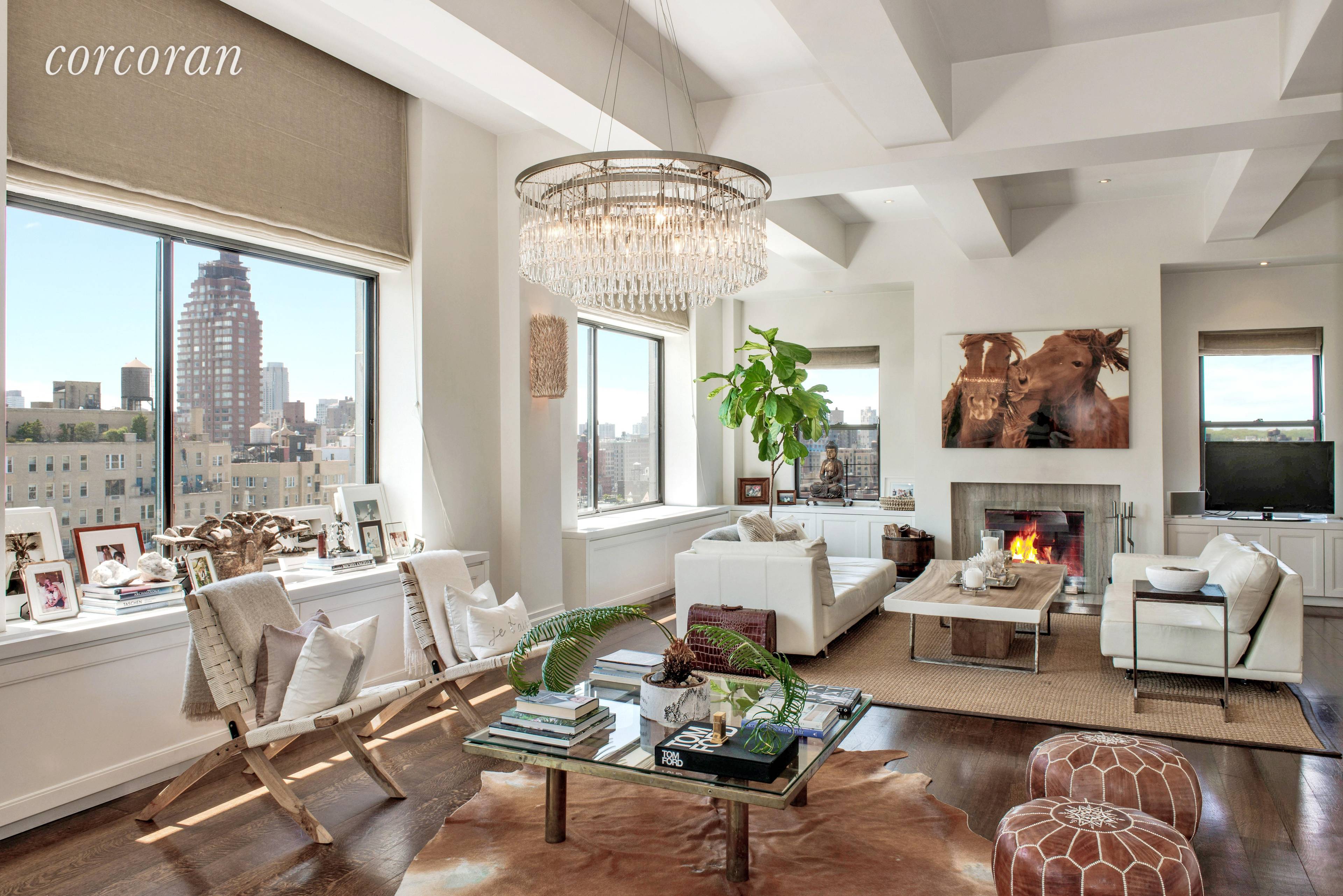 This spectacular loft like three bedroom corner duplex home has soaring 11 foot ceilings and six massive south facing picture windows with views of Central Park from every window.