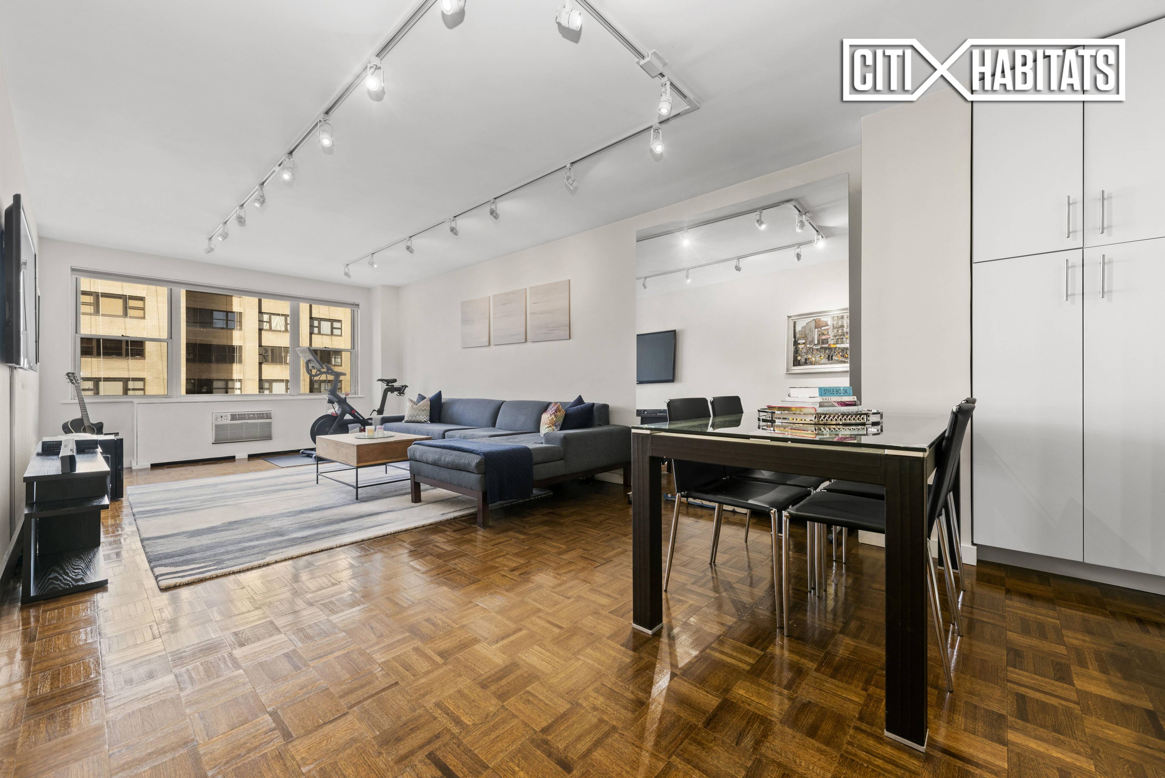 RARE floor through space front to back of building with 3 city exposures East, West, and North affording panoramic views and open gallery like feeling in this newly renovated architecturally ...