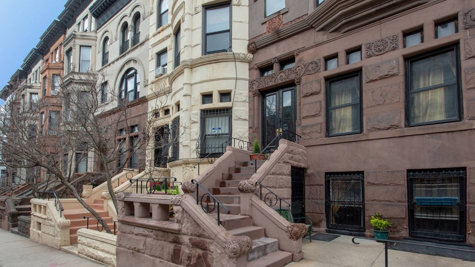 A blank canvas for your vision, this grand four level multi family brownstone awaits your loving restoration to its original splendor.