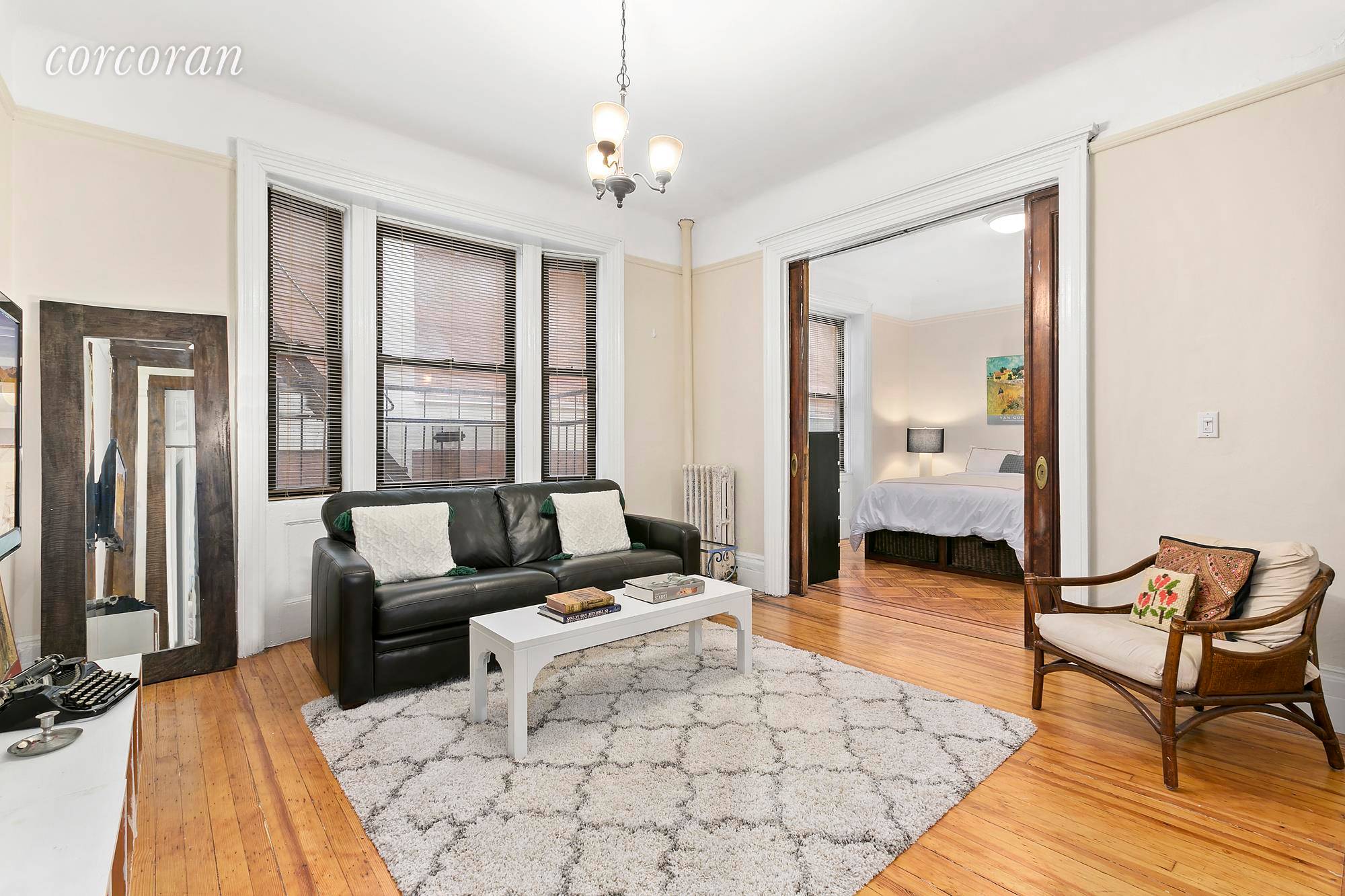 Artfully renovated Classic Pre war 2 Bed, 1 Bath, with high ceilings, over sized windows in every room and hardwood floors throughout.