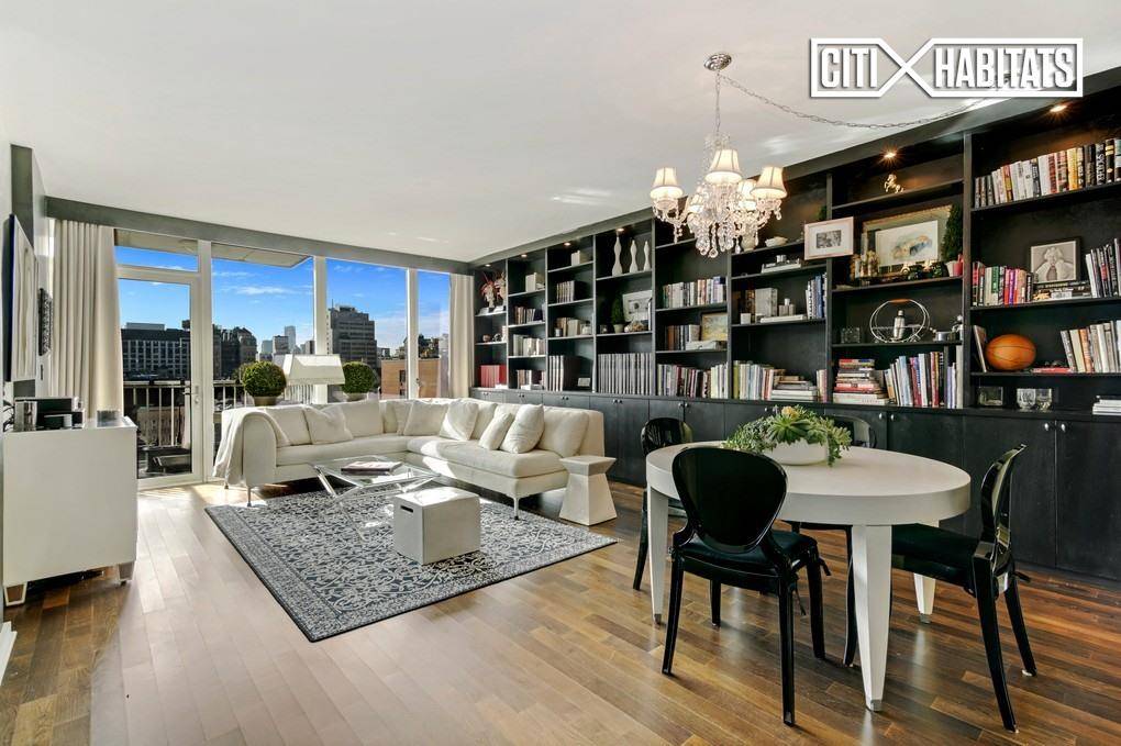 Originally a three bedroom, this sun splashed, oversized two bed, two and a half bath condominium is not to be missed and is easily convertible back to its original state.