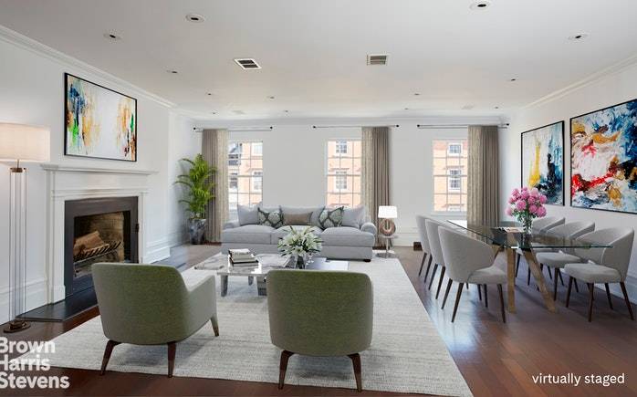This is a 21st Century loft like duplex penthouse in an elegant historic brownstone on one of the most desirable blocks in Chelsea.