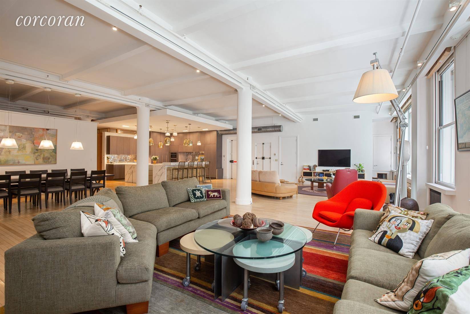 Spectacular 4, 713 square foot loft with towering 11 5 high ceilings, three exposures and twenty four double sets of Citiquiet windows is in a highly sought after boutique prewar ...