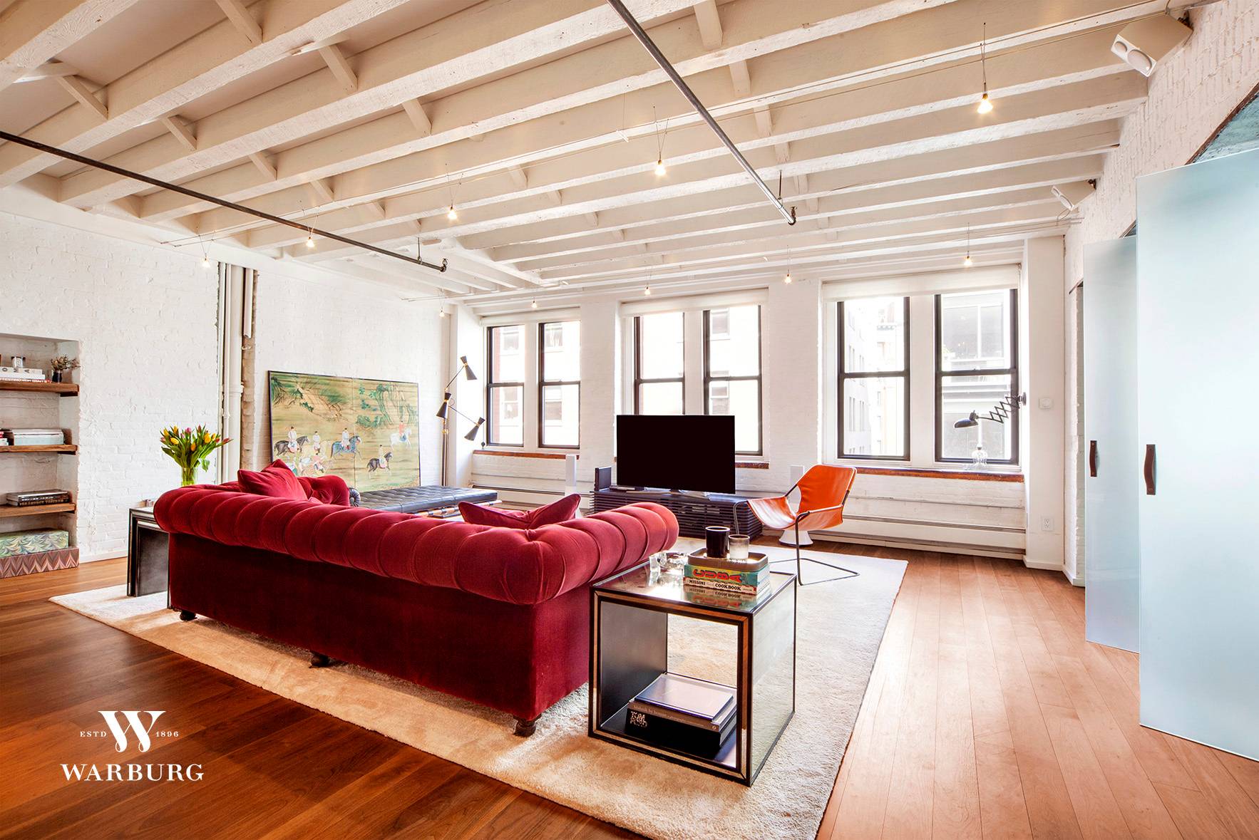 A rare Tribeca loft renovated to the highest standards while preserving and showcasing its original details and character.