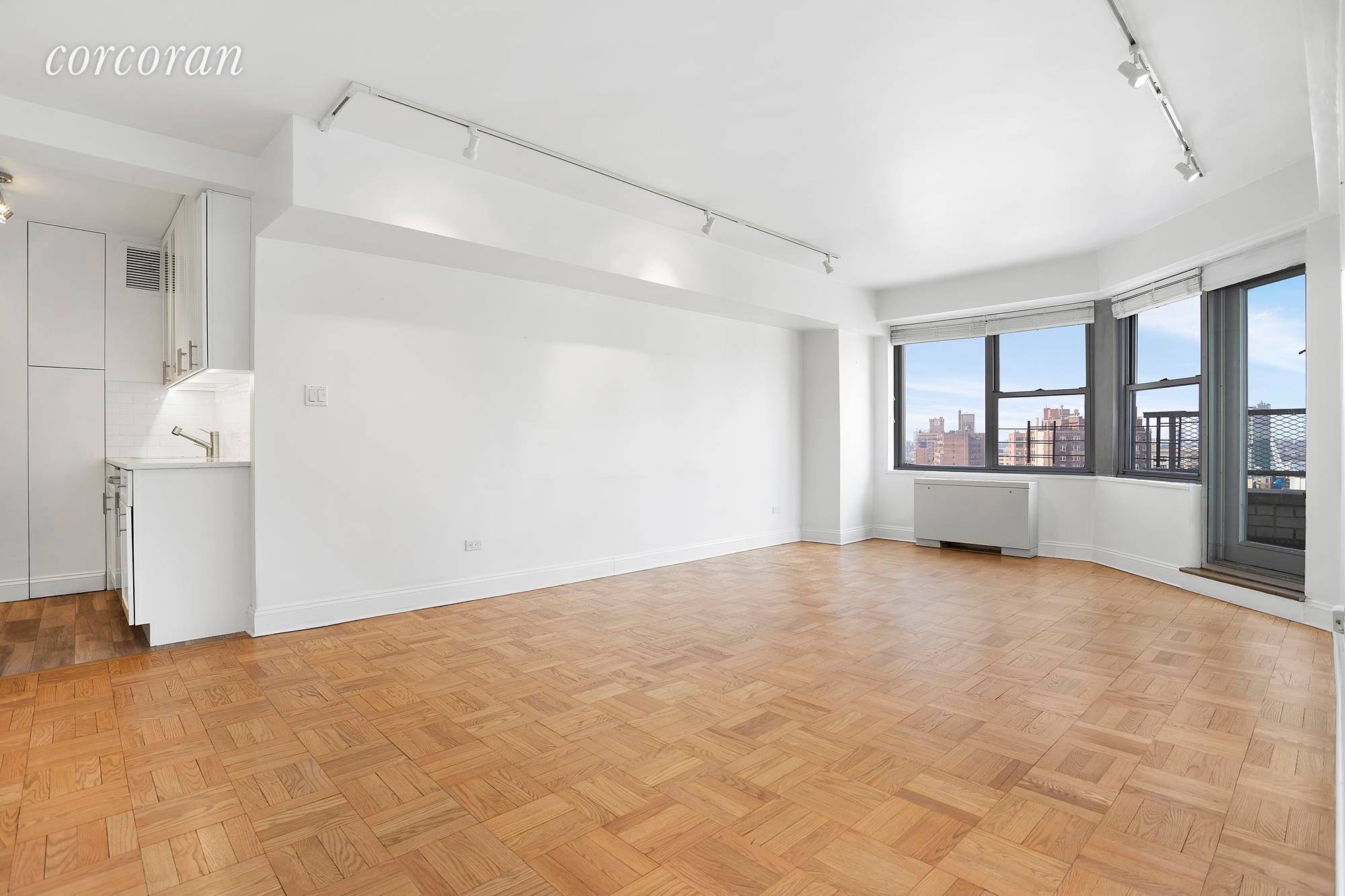 Residence 17E is a bright spacious one bedroom with a terrace with North, South and West exposures of city views, sunsets, the Hudson River and Hudson Yards to the North.